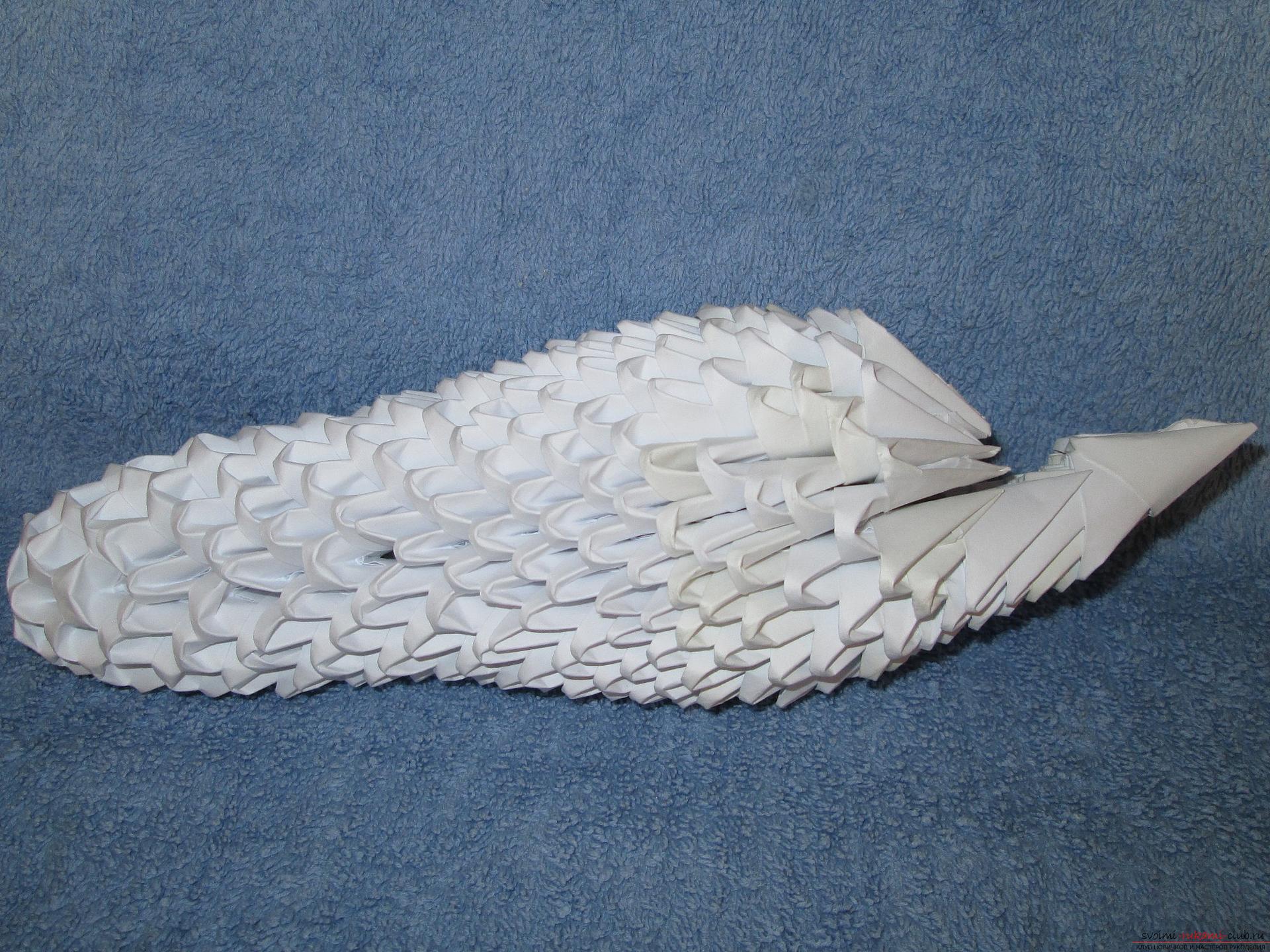 Если вы любите собирать модульное оригами, этот мастер-класс по созданию дельфина из бумаги для вас.. Фото №19